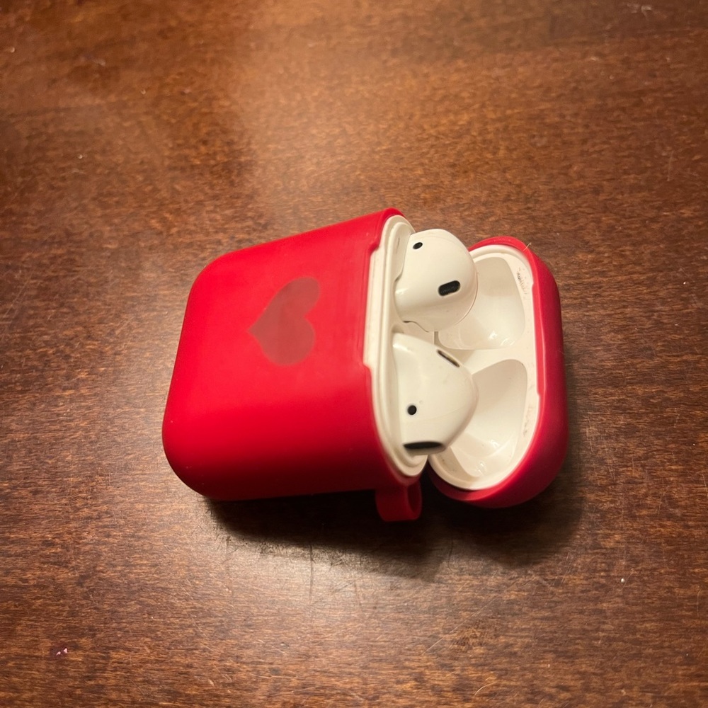 White AirPods w/ case